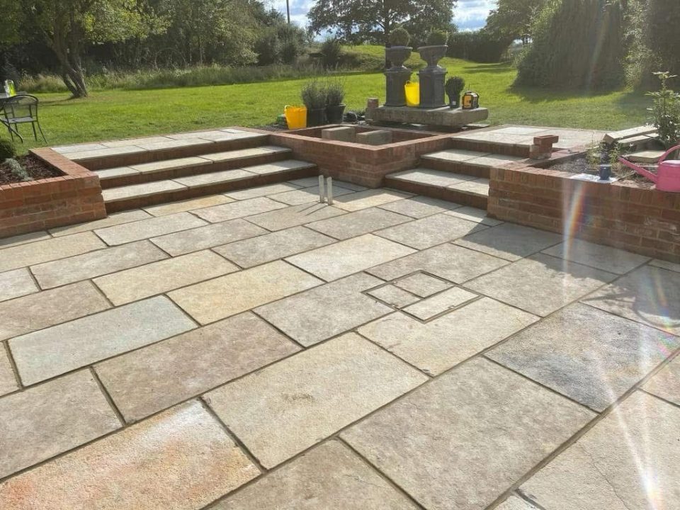 Stunning New Patio featuring high quality natural stone slabs. Essex. Get a FREE quote today on 07788 637 501